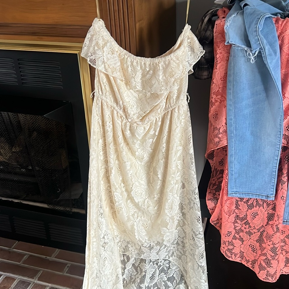 Ladies, high low dress and cream color size large.